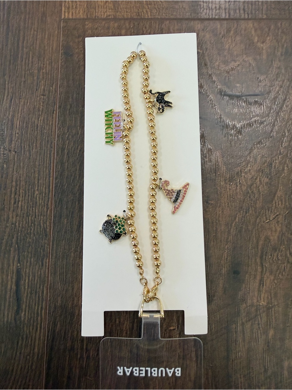 BaubleBar Gold Charm/ Halloween Phone Charm Wristlet